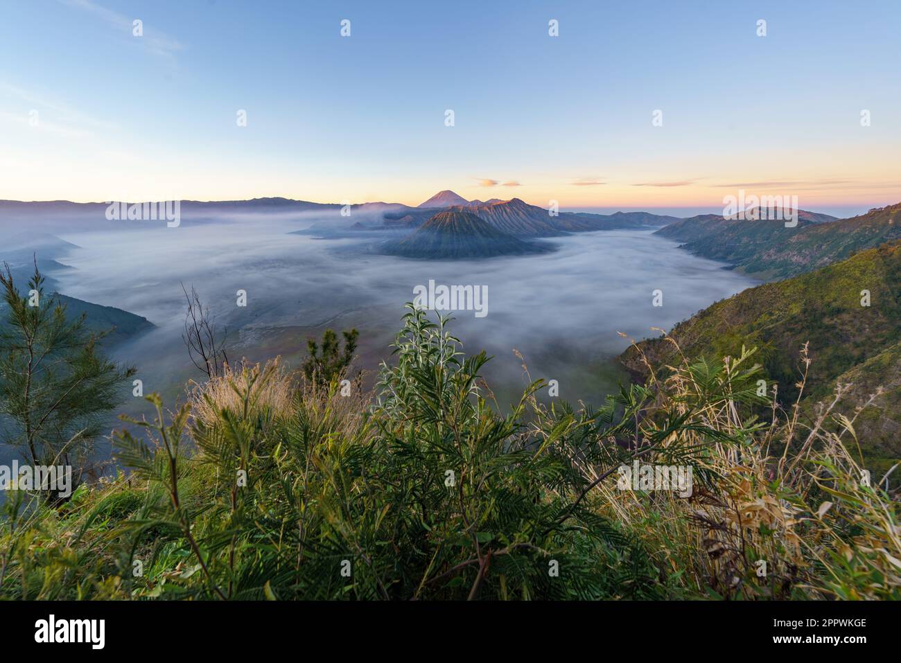 Aerial view of Mt Bromo and rural landscape at sunrise, Indonesia Stock Photo