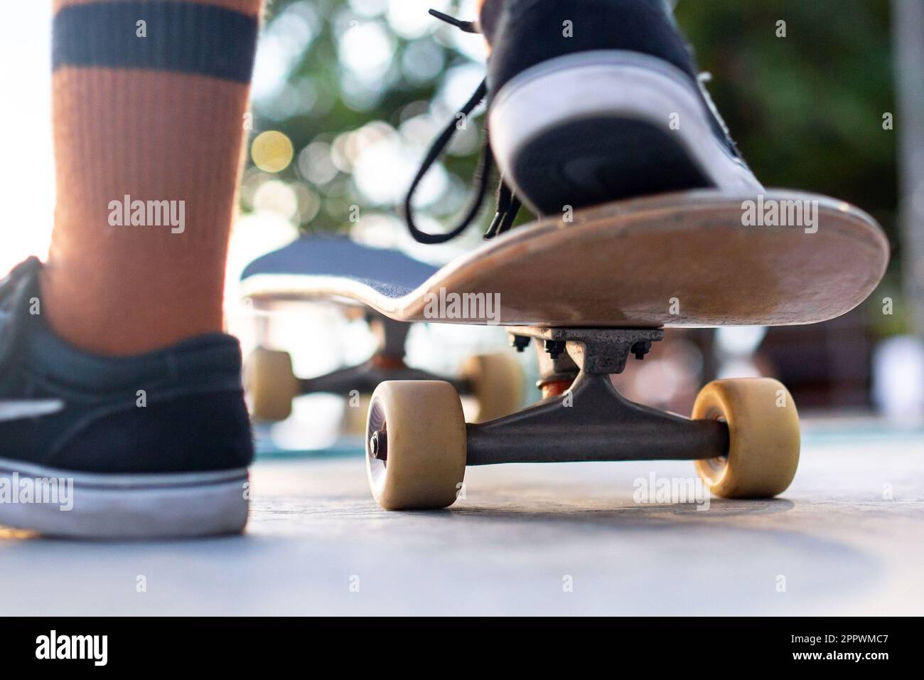 Skateboarding themed photograph with a natural lighting Stock Photo