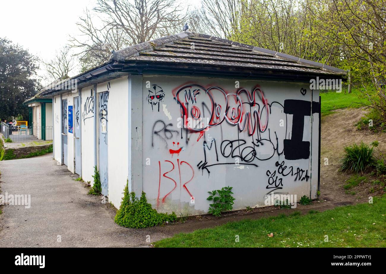 The closed council public toilets covered in graffiti tags in the ...