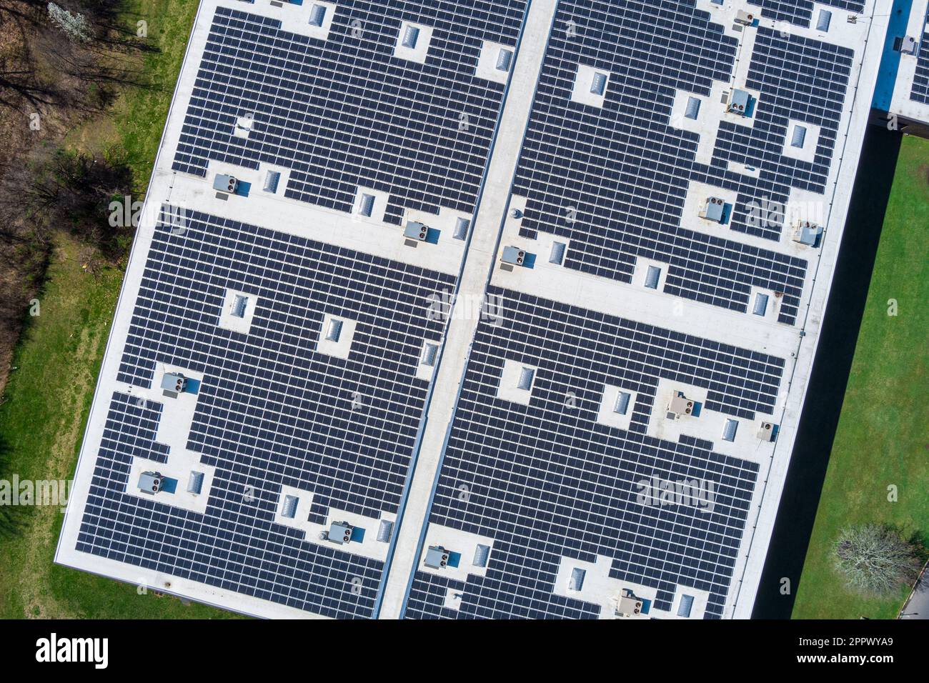 Aerial view of solar panels on roof of commercial building, New Jersey USA Stock Photo