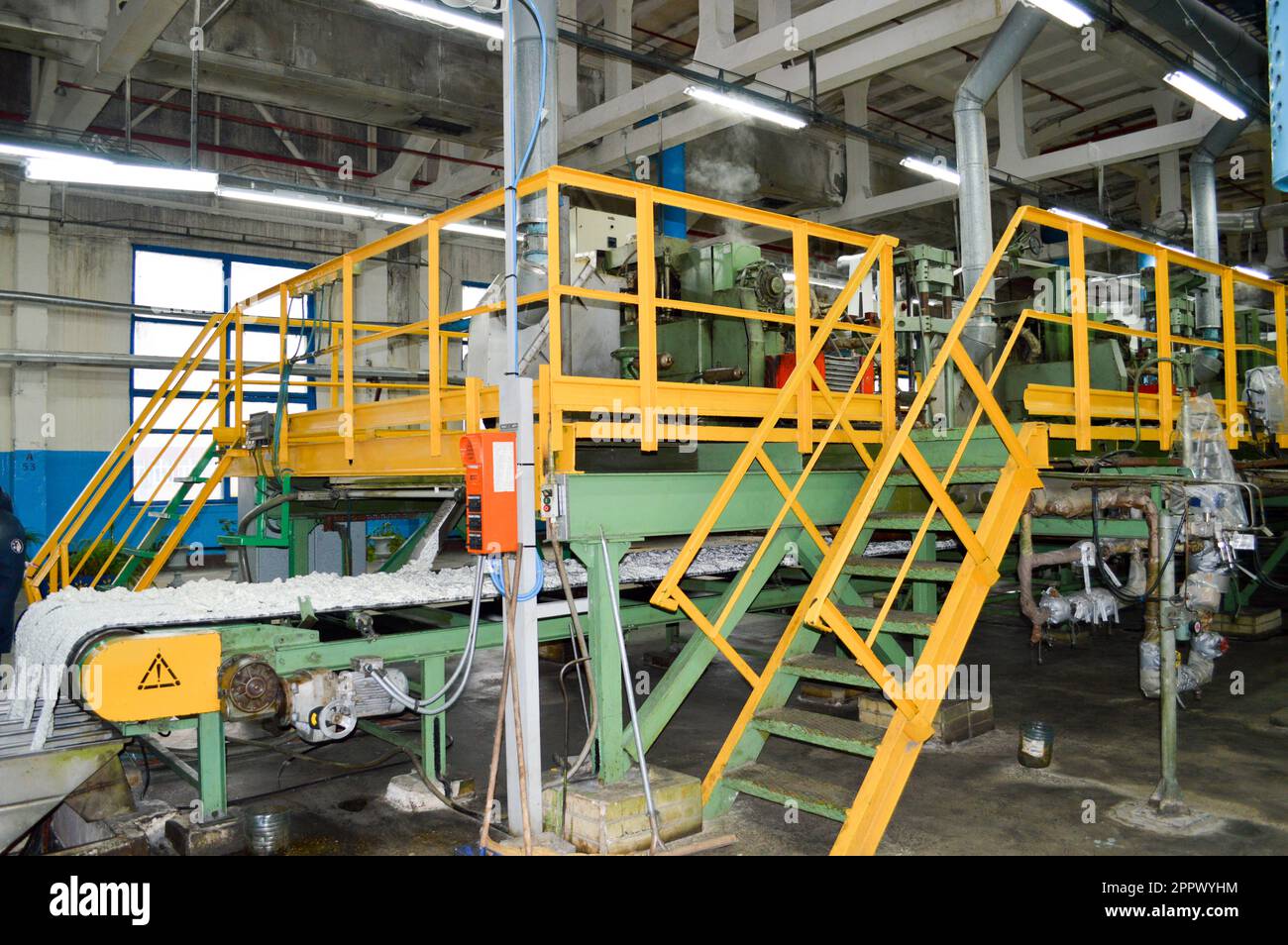 A line, a conveyor for manufacturing white synthetic acrylic fiber at a