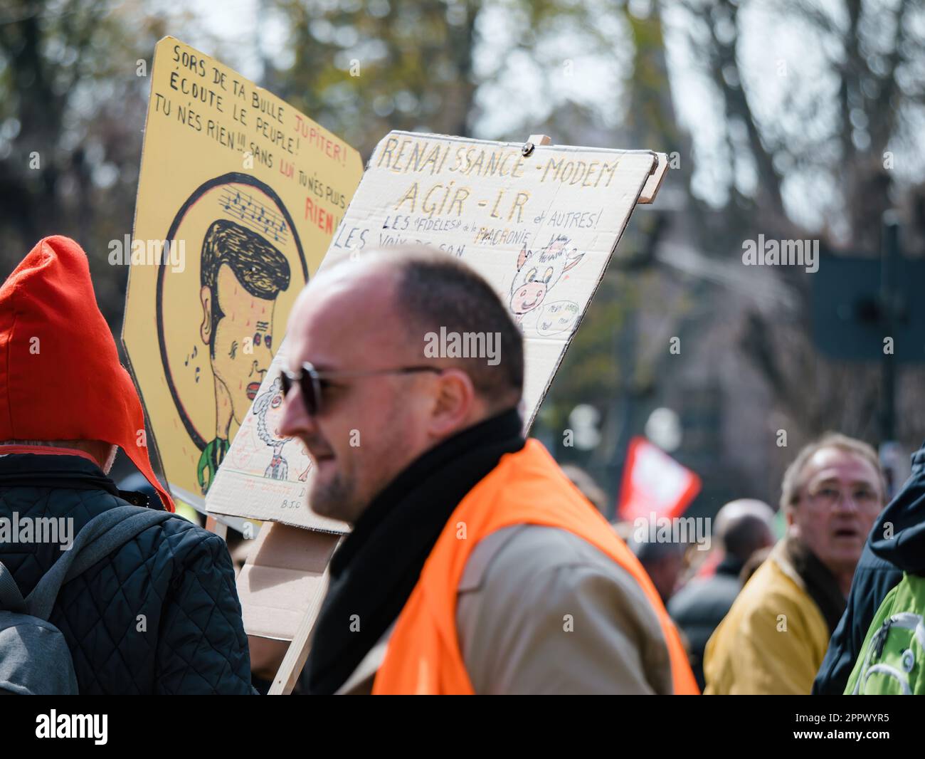 Strasborg, France - Mar 29, 2023: Group of protesters in the streets of Strasbourg, France, demonstrating against a recent rise in pension age. Weeks- Stock Photo