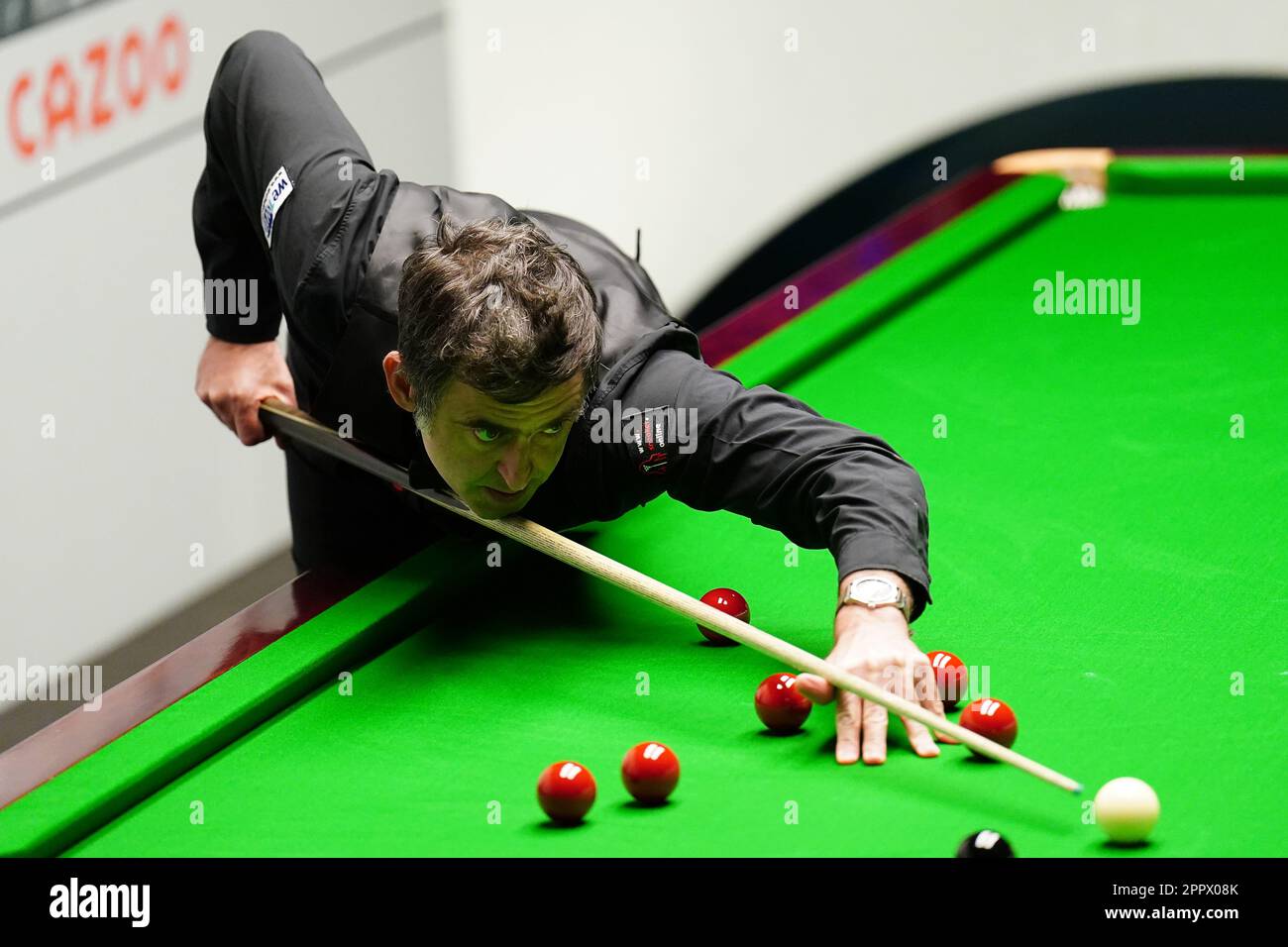 Ronnie OSullivan in action against Luca Brecel (not pictured) on day eleven of the Cazoo World Snooker Championship at the Crucible Theatre, Sheffield