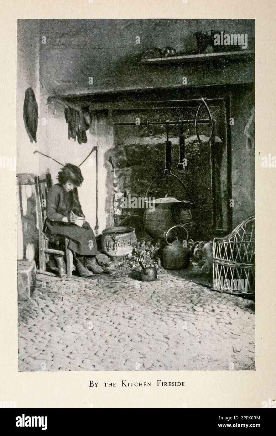 By The Kitchen fireside photograph from the book ' The Isle of the shamrock ' by Clifton Johnson, 1865-1940 Publication date 1901  Publisher New York, Macmillan; London, Macmillan Stock Photo