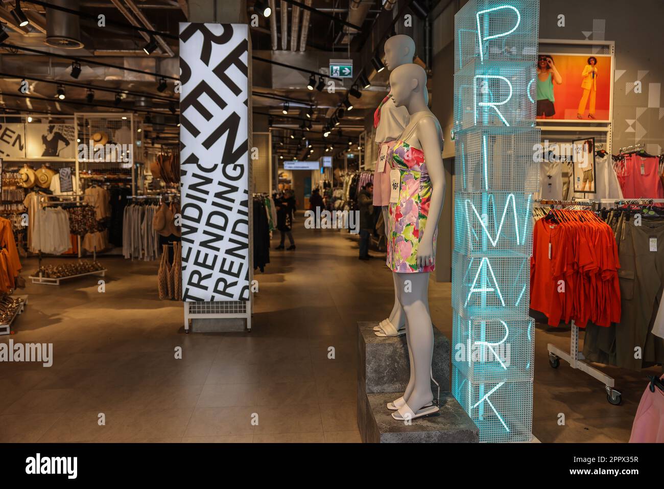 Wuppertal, Germany. 25th Apr, 2023. A sign hangs in a garment in the  Primark store in Wuppertal. Low-cost fashion chain Primark plans to close  four stores and cut 420 jobs in Germany. (