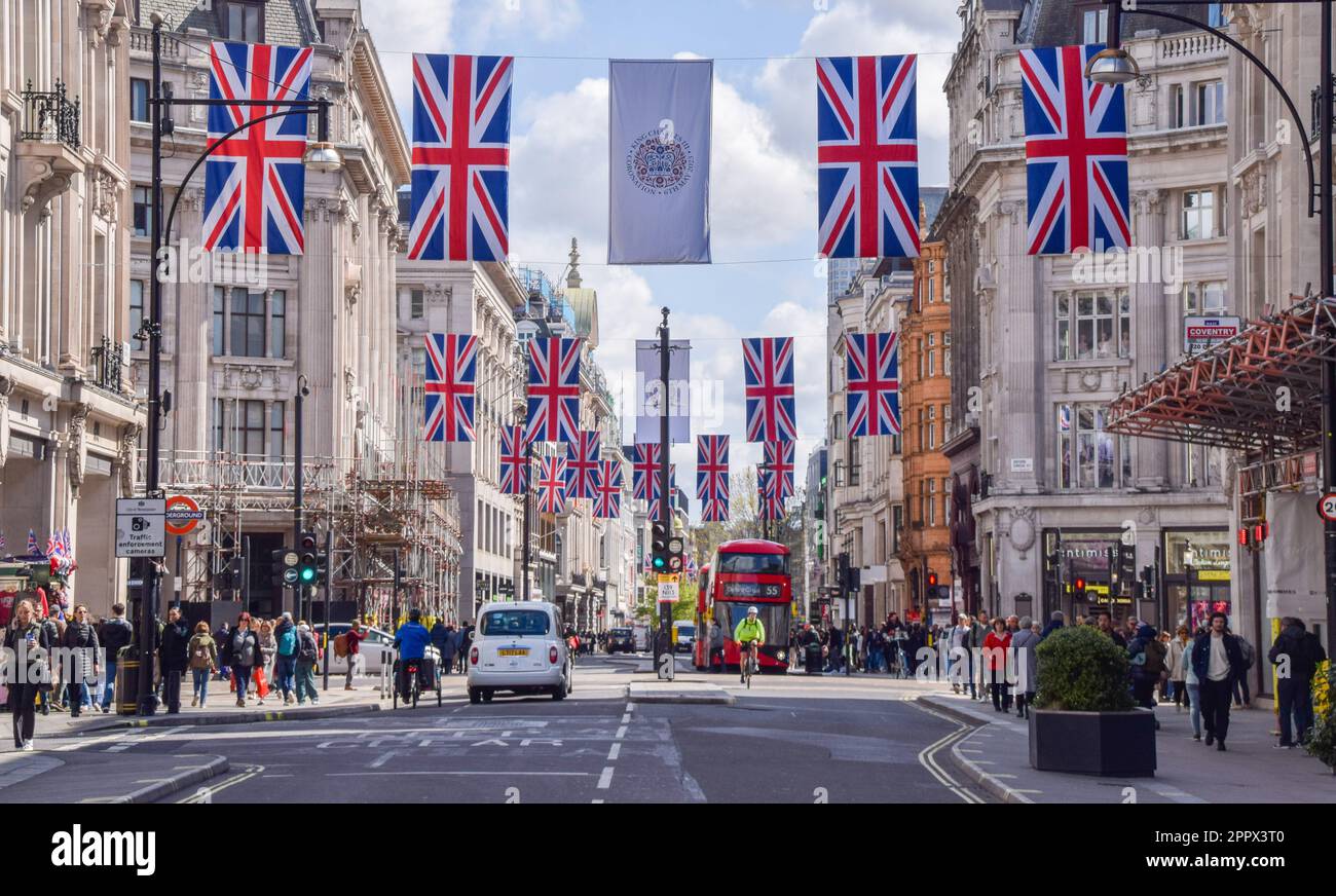 London, UK. 25th April 2023. Union Jacks decorate Oxford Street as preparations for the