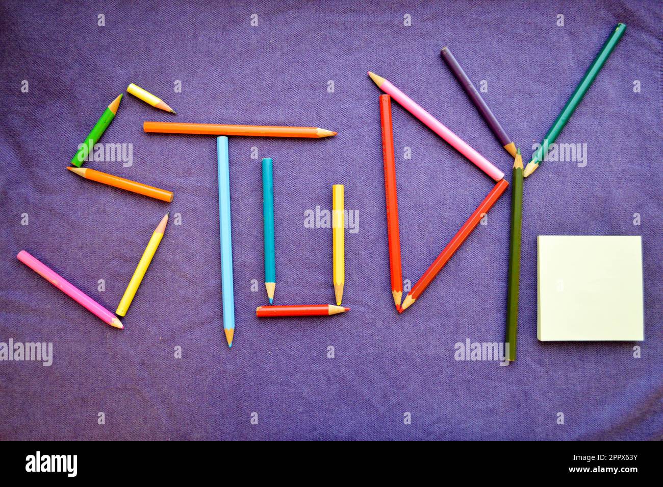 Compose a study written with colored pencils and a notebook for your ...