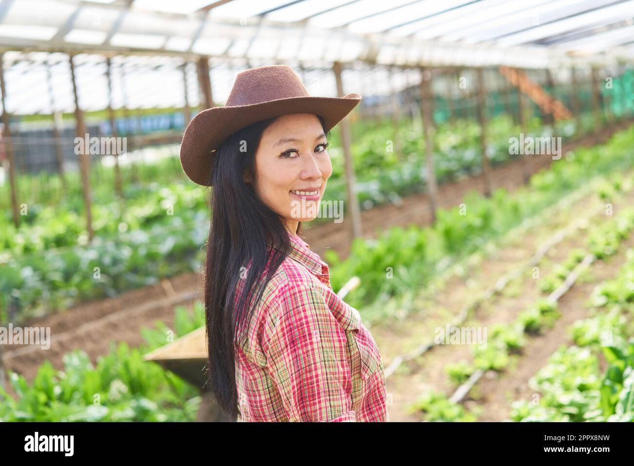 Portrait female farmer wearing hat hi-res stock photography and images ...