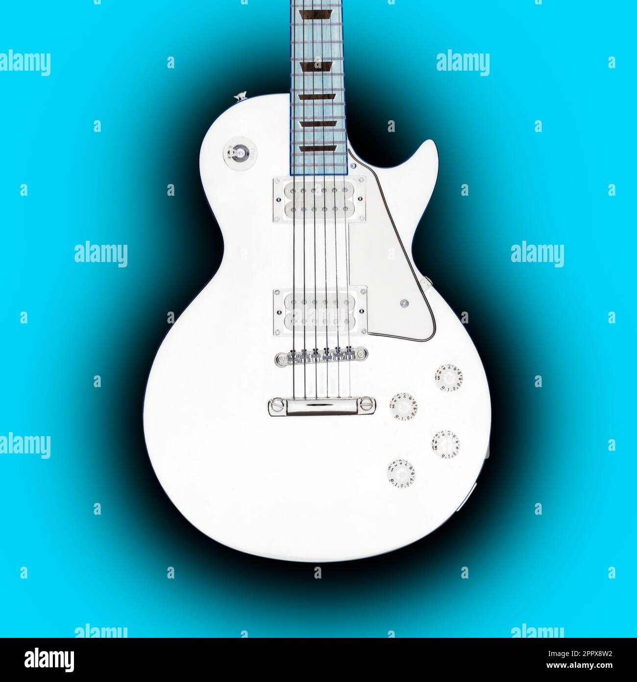 Black guitar reversed and turned into a White guitar isolated on blue