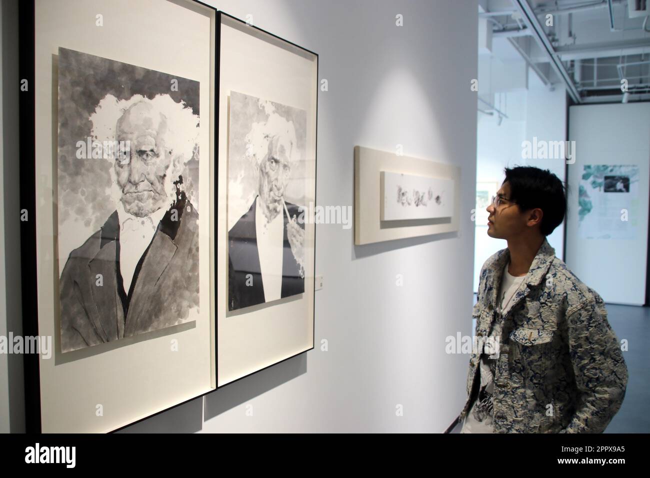 People visit a contemporary ink art exhibition in Suzhou City, east
