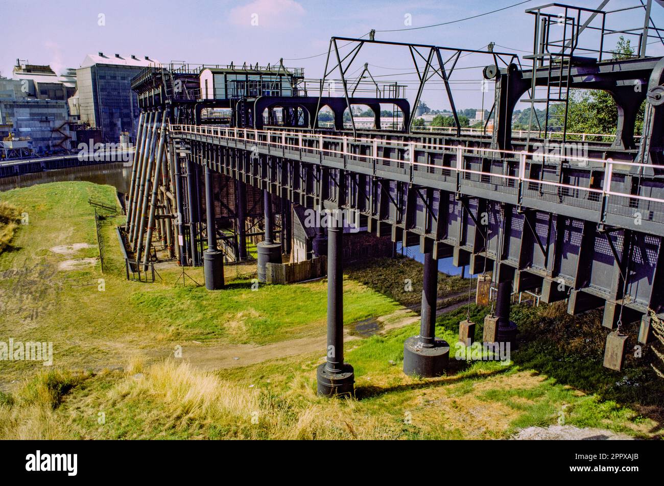 The Anderton Boat Lift is a two-caisson lift lock near the village of Anderton, Cheshire, in North West England. Prior to its restoration in 2000 Stock Photo