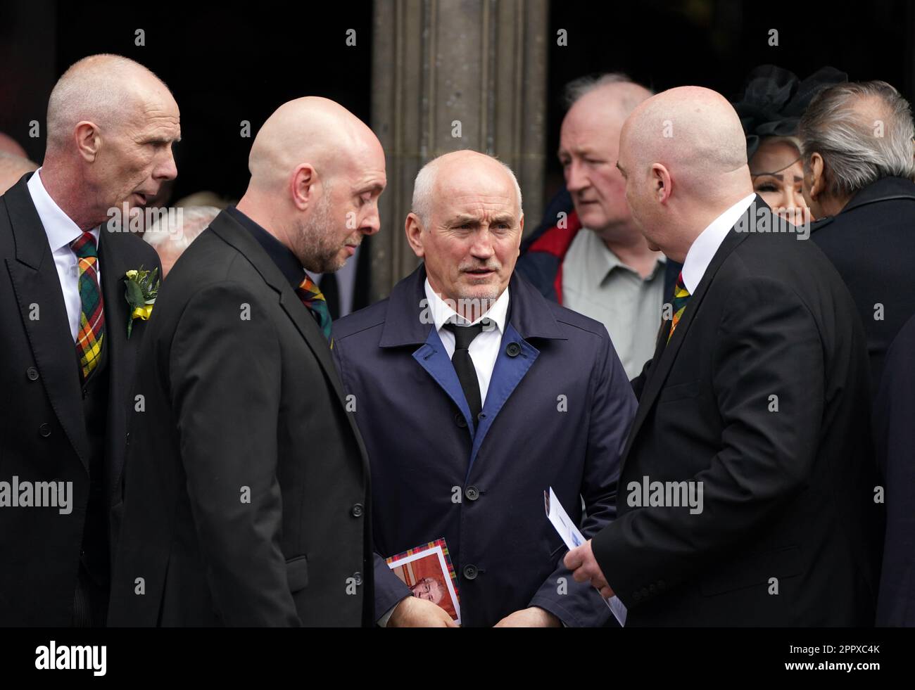 Barry McGuigan (centre) with Mark Buchanan (second left) following a
