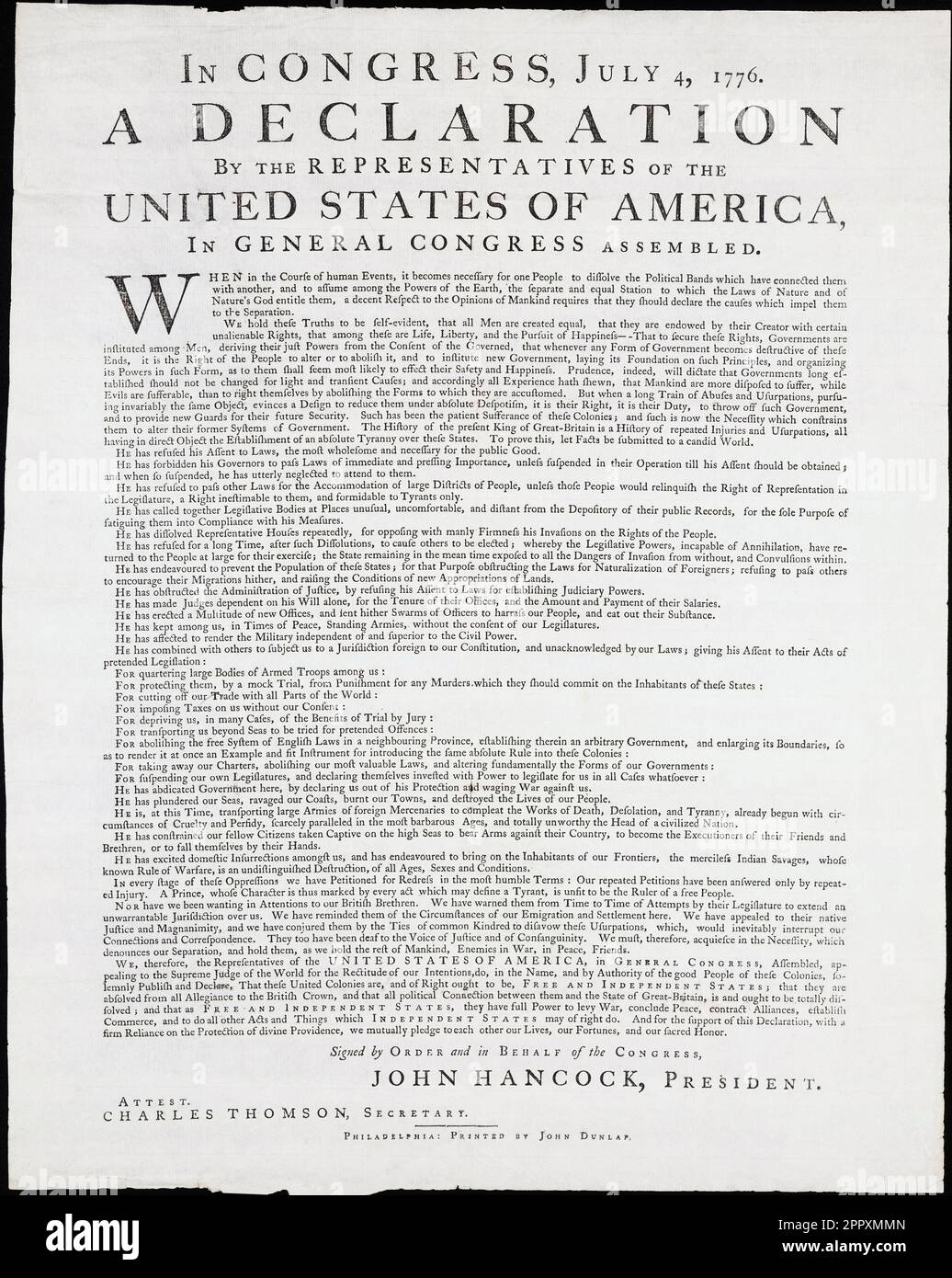 The United States Declaration of Independence.  This is a reproduction of a copy which was produced in unknown numbers and known as the Dunlap Broadside.  It is named after the printer, Irish immigrant John Dunlap, who typeset and printed the Declaration the same night it was presented to the Second Continental Congress, July 4, 1776. Stock Photo