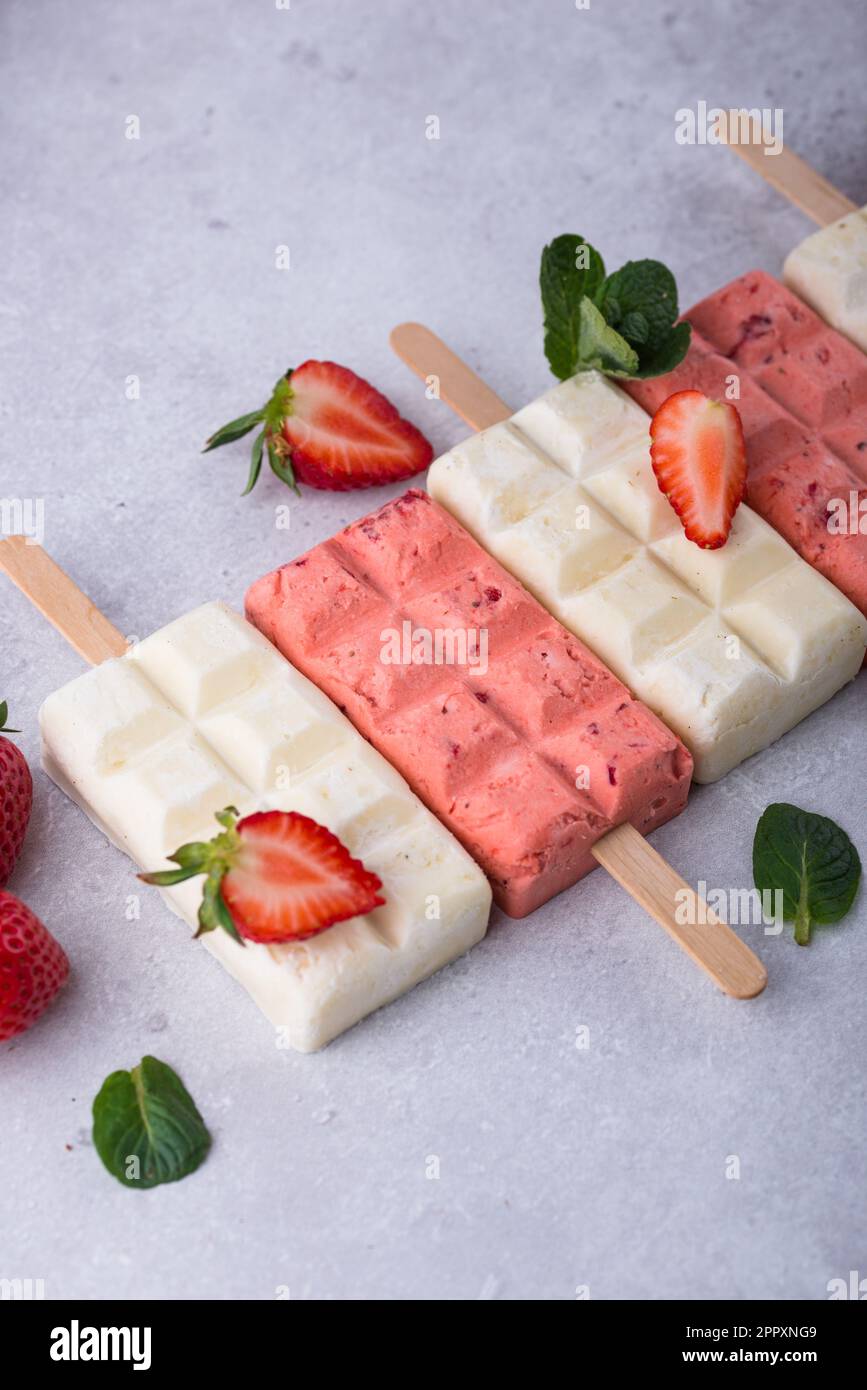 Strawberry ice cream pop sicle with mint Stock Photo Alamy