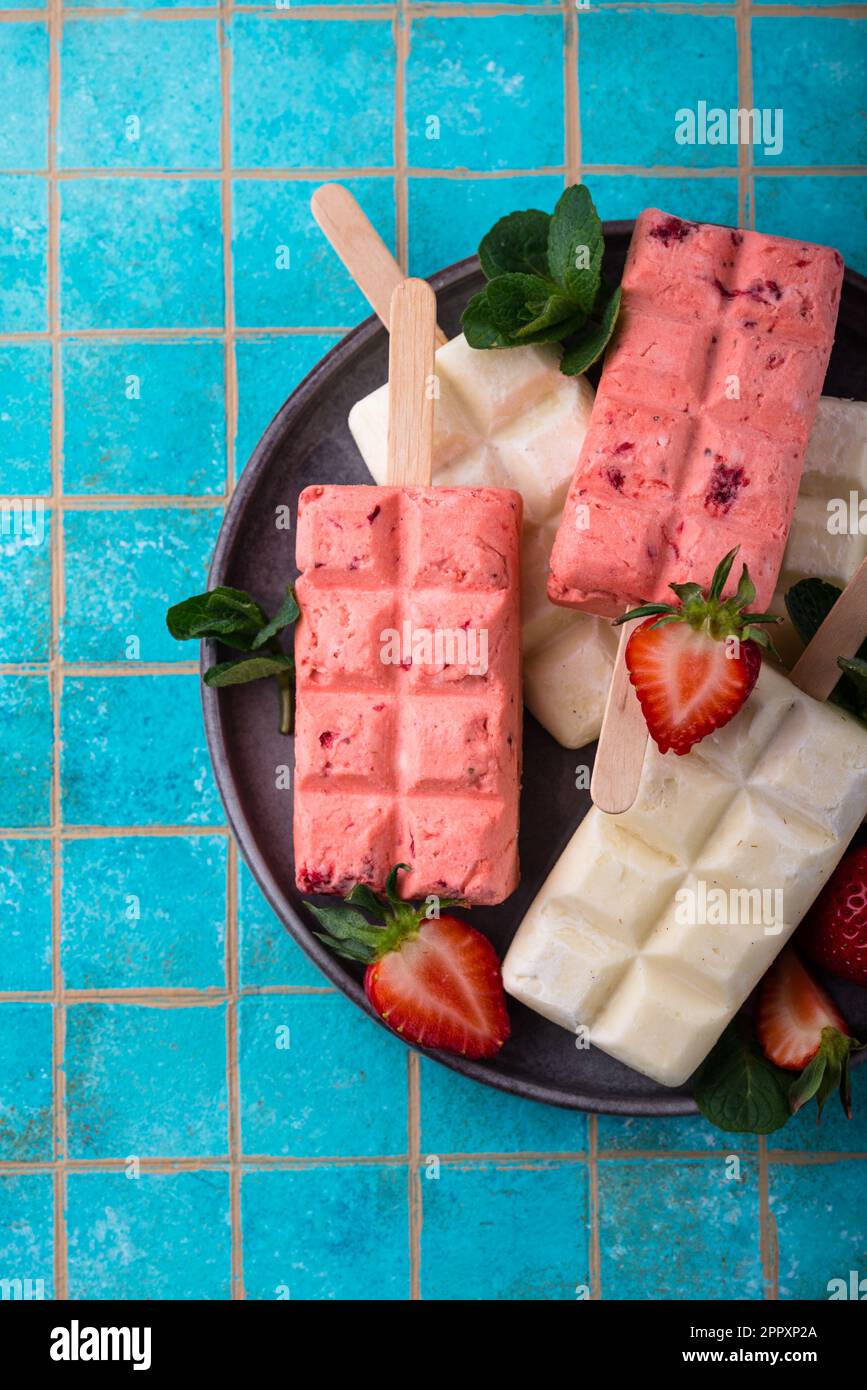 Strawberry ice cream pop sicle with mint Stock Photo Alamy