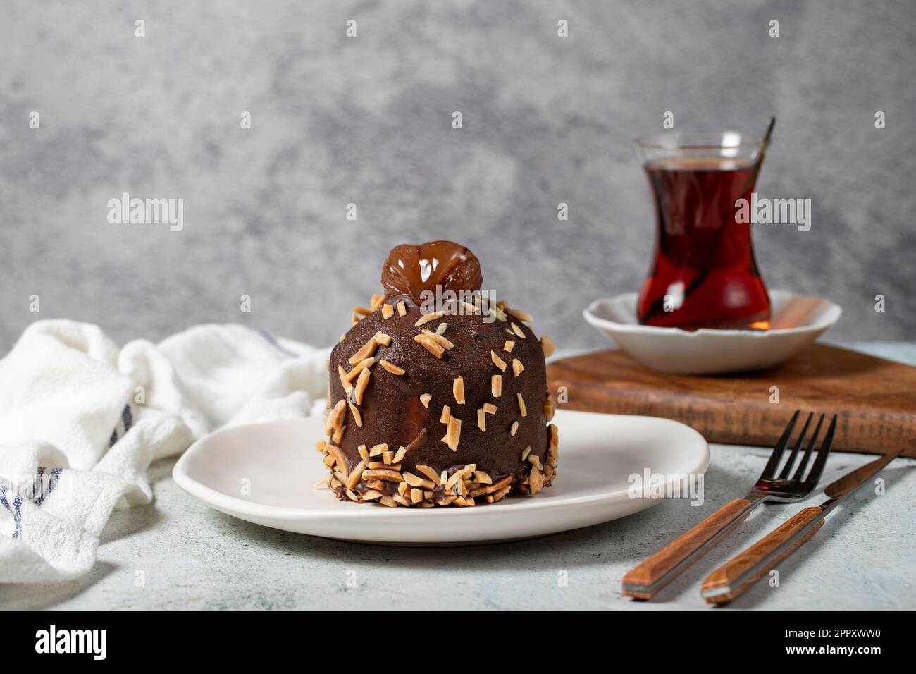 Chestnut and chocolate cream cake. Delicious cake with cream filling. Studio shoot. Bakery products Stock Photo