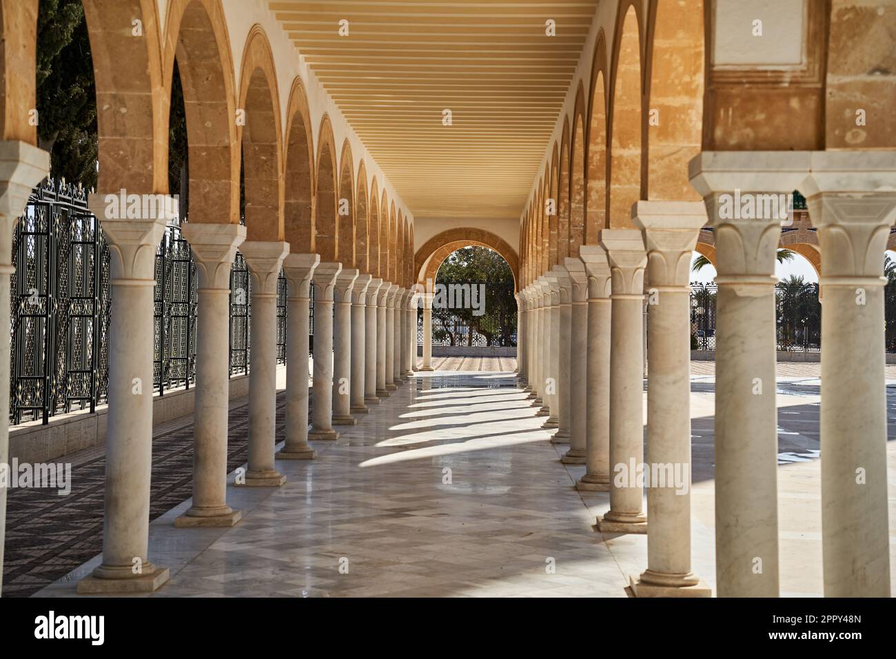 Monastir, Tunisia, January 31, 2023: Colonnade in the mausoleum of the Tunisian founder Habib Bourguiba, central perspective Stock Photo