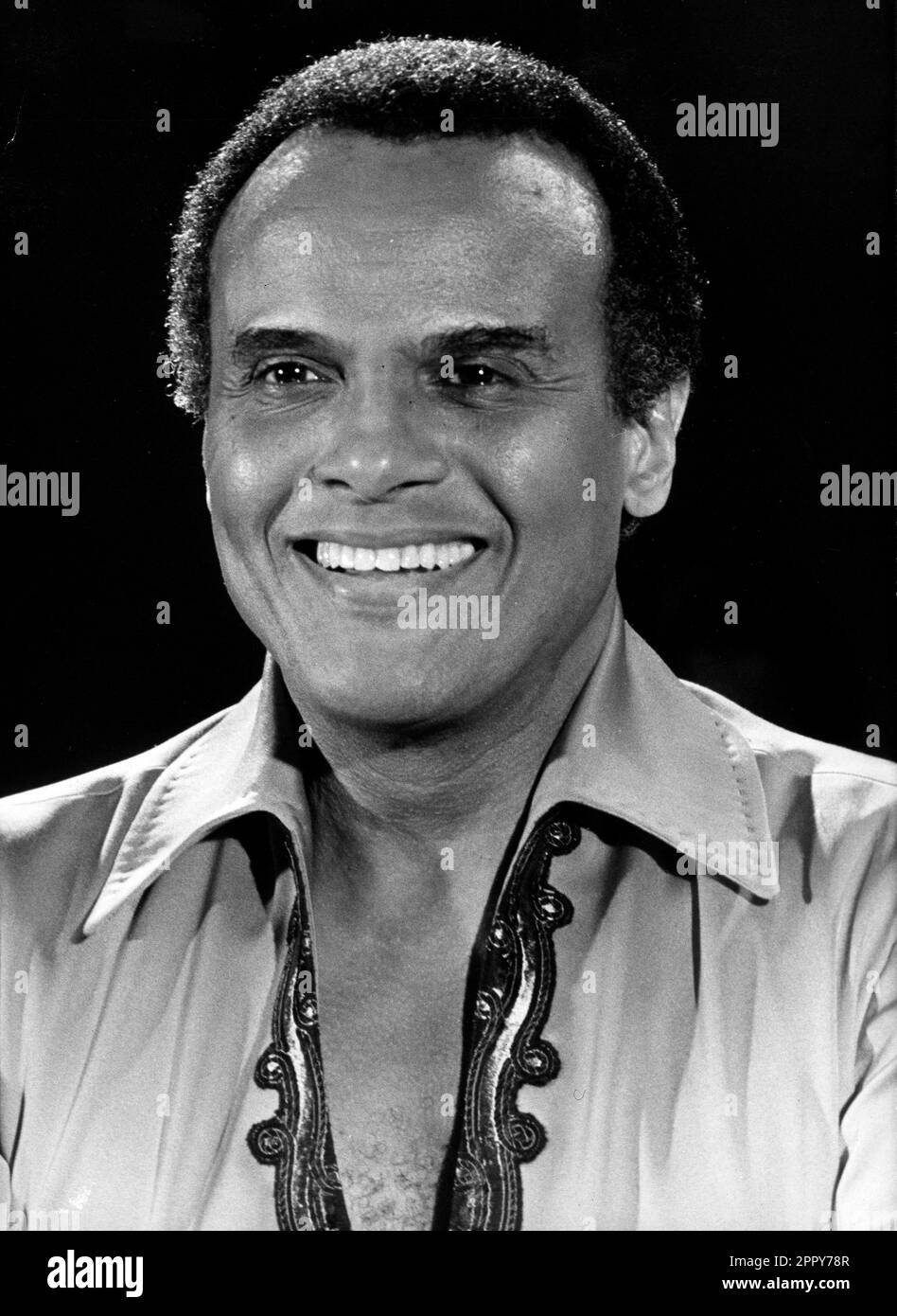 April 25, 2023: HARRY BELAFONTE, the dashing singer, actor and activist who became an indispensable supporter of the civil rights movement, has died according to his publicist Ken Sunshine. He was 96. Belafonte died Tuesday morning of congestive heart failure, Sunshine said. Belafonte was dubbed the ''King of Calypso'' after the groundbreaking success of his 1956 hit, ''The Banana Boat Song (Day-O).'' He also became a movie star after acting in the film adaption of the Broadway musical, ''Carmen Jones.'' FILE PHOTO SHOT ON: Oct. 27, 1956, New York, NEW YORK, USA: Portrait of American calypso s Stock Photo