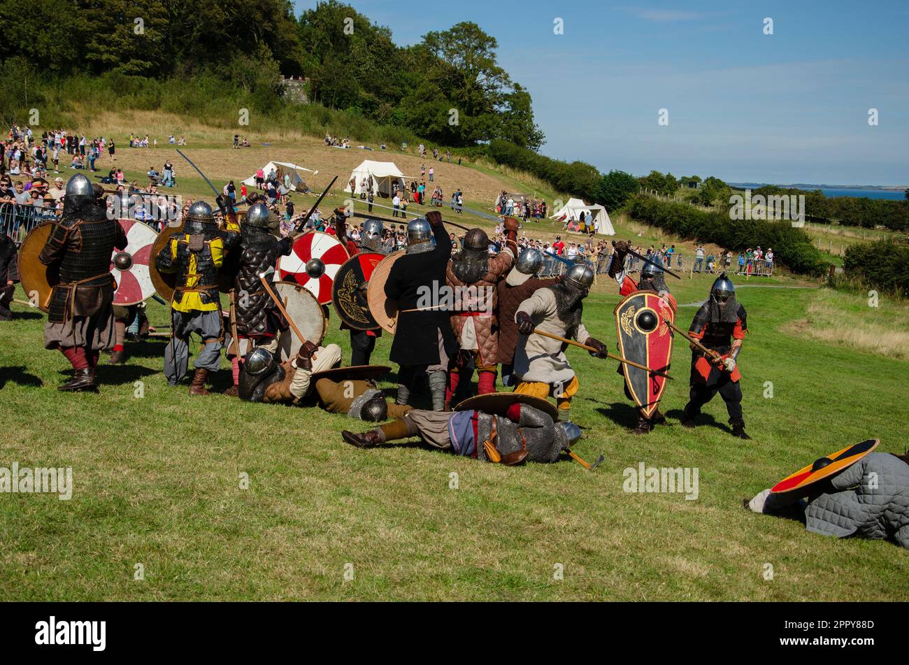 Delamont County Down Northern Ireland - August 27 2022 - Vikings in battle during the Magnus Barelegs re-enactment festival Stock Photo