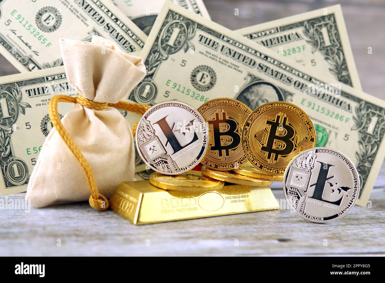 Physical version of Bitcoin and Litecoin (new virtual money) and banknotes  of one dollar. Exchange bitcoin for a dollar. Conceptual image for worldwid  Stock Photo - Alamy