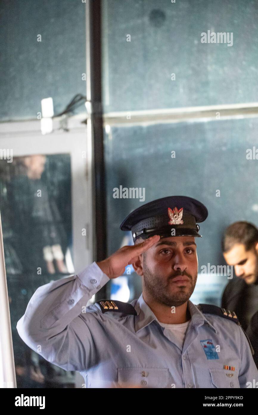 Harish, Israel. A Israeli officer salutesduring a memorial day service. Memorial day services are held statewide each year in the day before Israel's independence day, on the 4th of the Hebrew month Iyar. The ceremony is held to remember those who died during their military service or were killed in terrorist attacks. Stock Photo