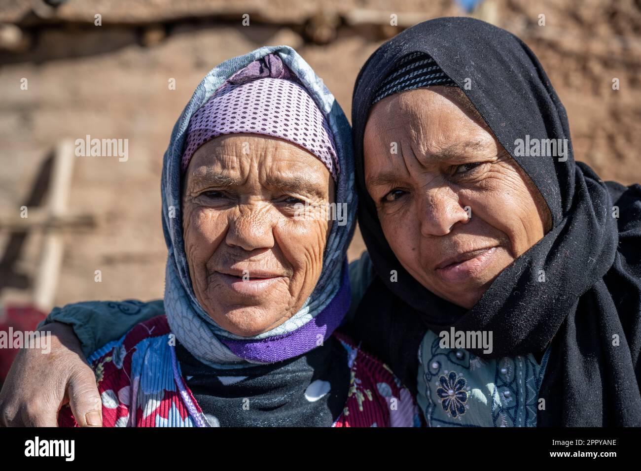 Couple of berber women looking at the camera. Stock Photo
