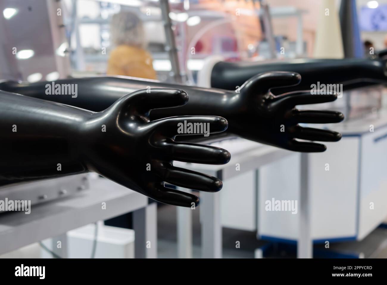 Two latex inflated gloves on medical equipment exhibition Stock Photo