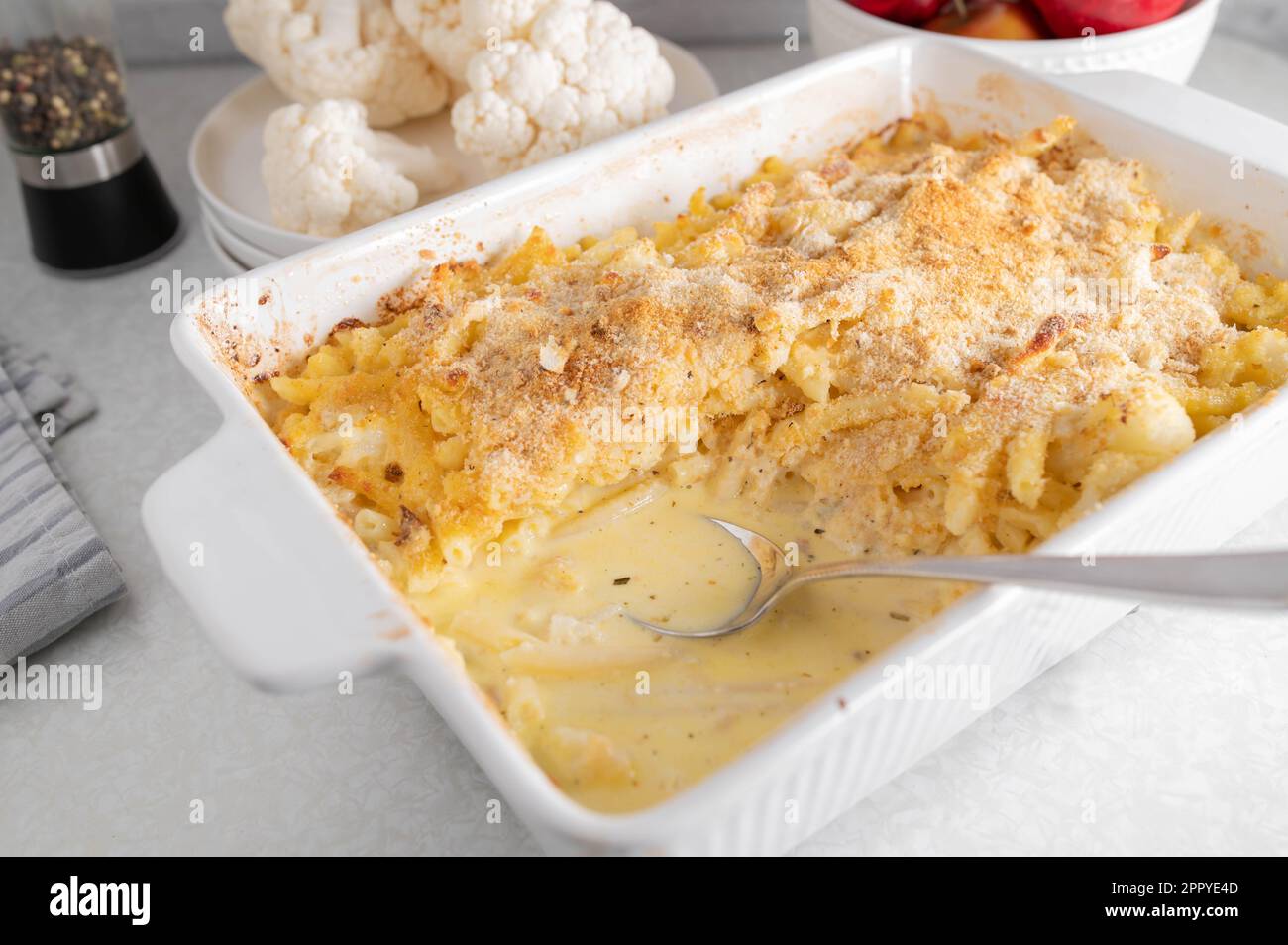 Pasta casserole with macaroni noodles, cauliflower, cheese sauce and