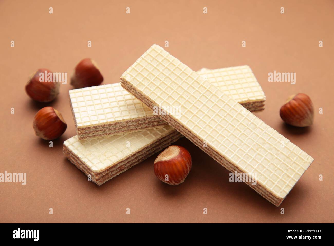 Wafers, cookies and sweets concept with hazelnut, chocolate and vanilla