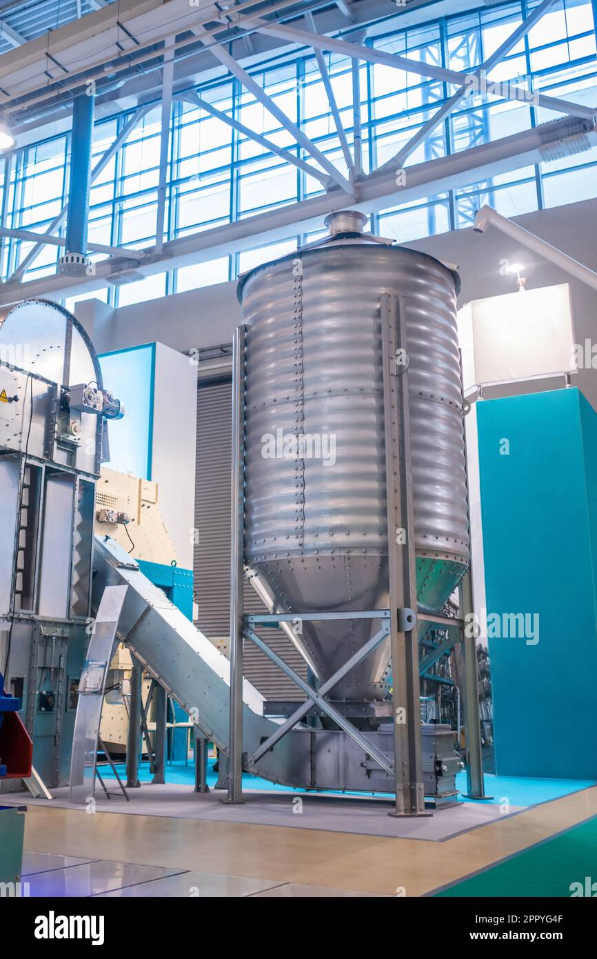 Grain store silo with discharge hopper storage of agricultural food production Stock Photo Alamy