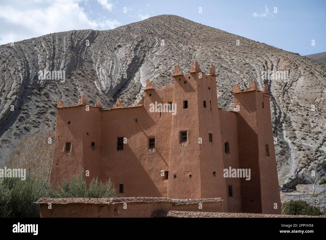 Ruins of an adobe kasbah in a village near the Dades Gorge. Stock Photo