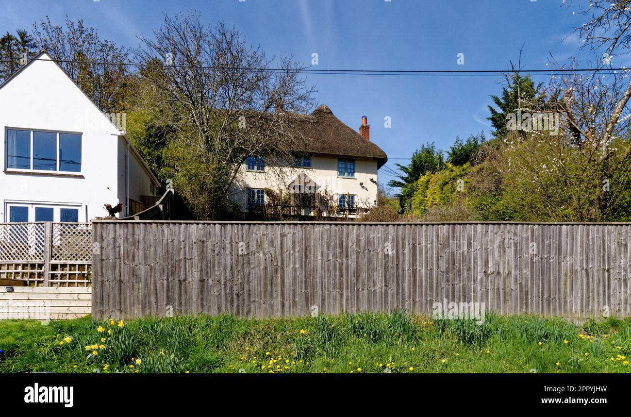 English rural landscape with cottages in Upper Woodford village near Salisbury in Southern England, United Kingdom - 8th of April 2023 Stock Photo