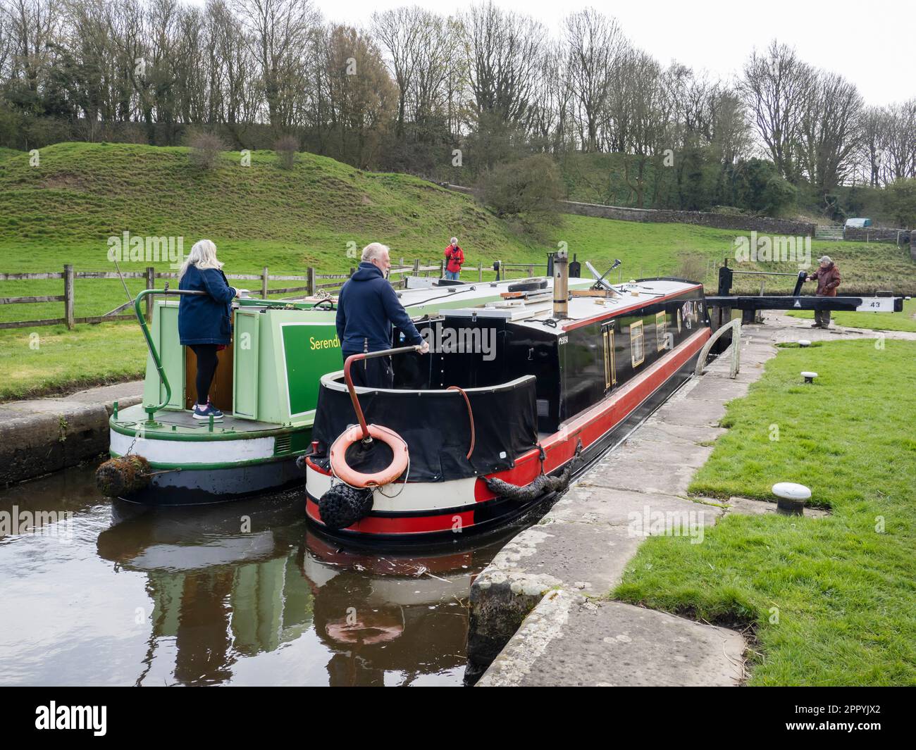 A boat going through a lock on the Leeds Liverpool Canal at