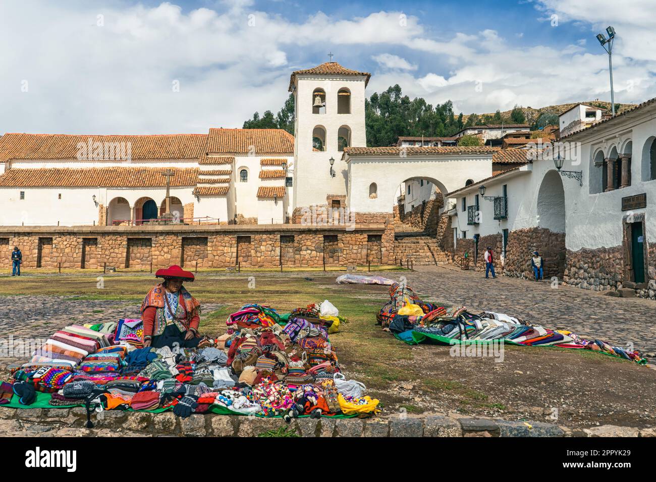 Artisan seller of native goods and souvenirs at Chinchero central square Stock Photo