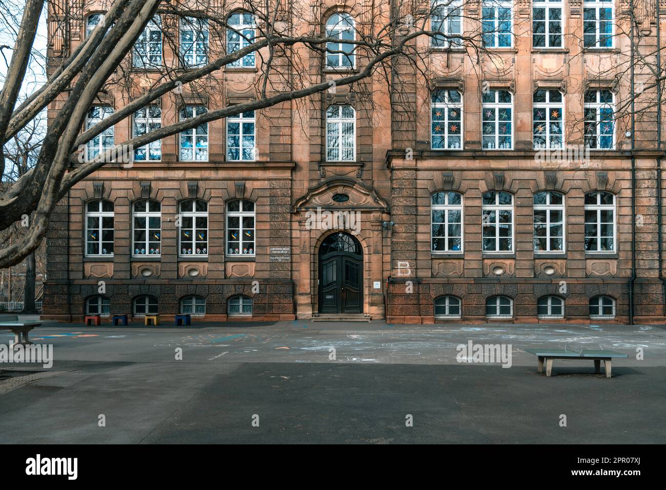 Historical elementary school building with schoolyard in Neustadt an der Weinstrasse, Germany Stock Photo