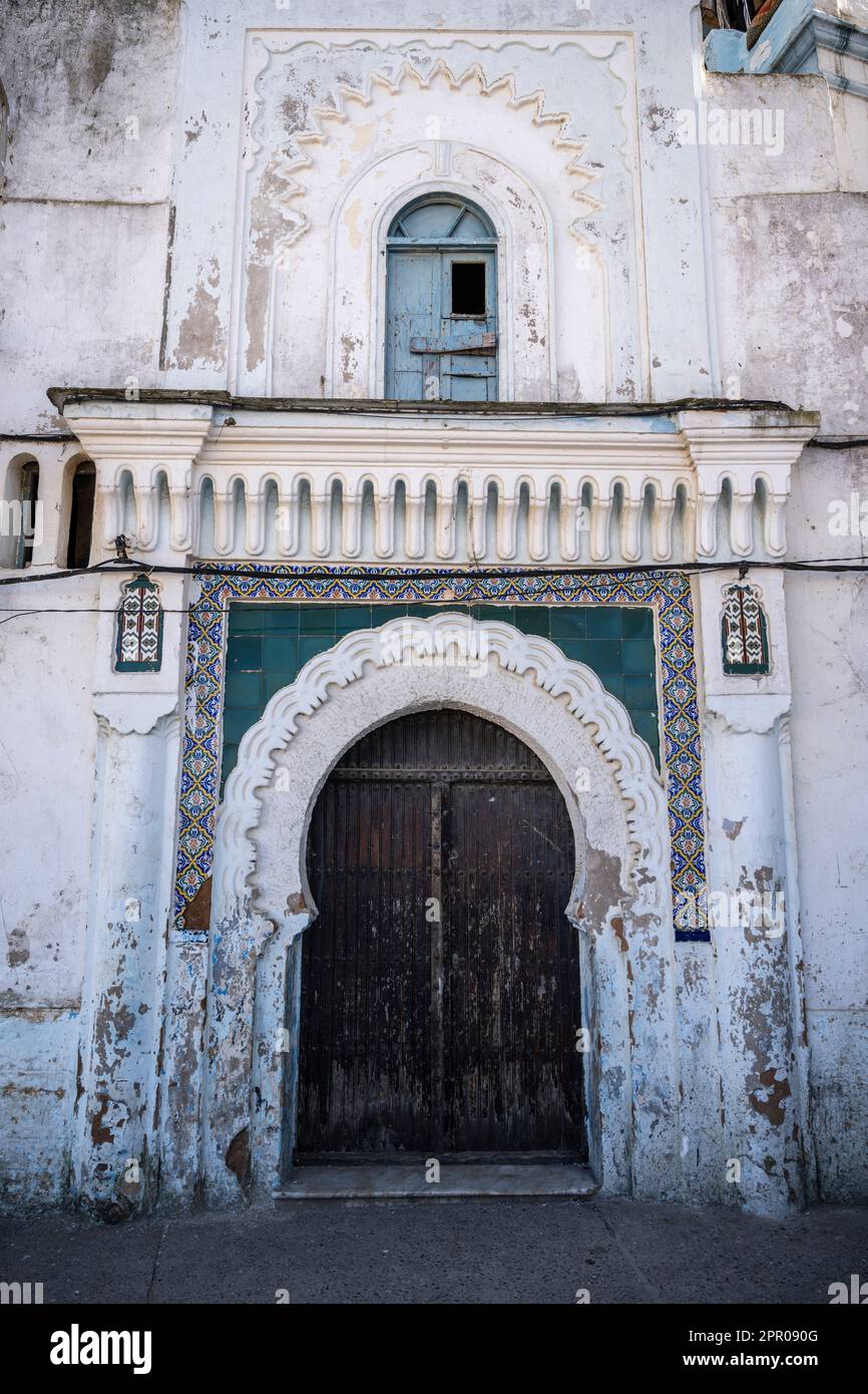 Entrance door to an old house in the medina of Larache. Stock Photo