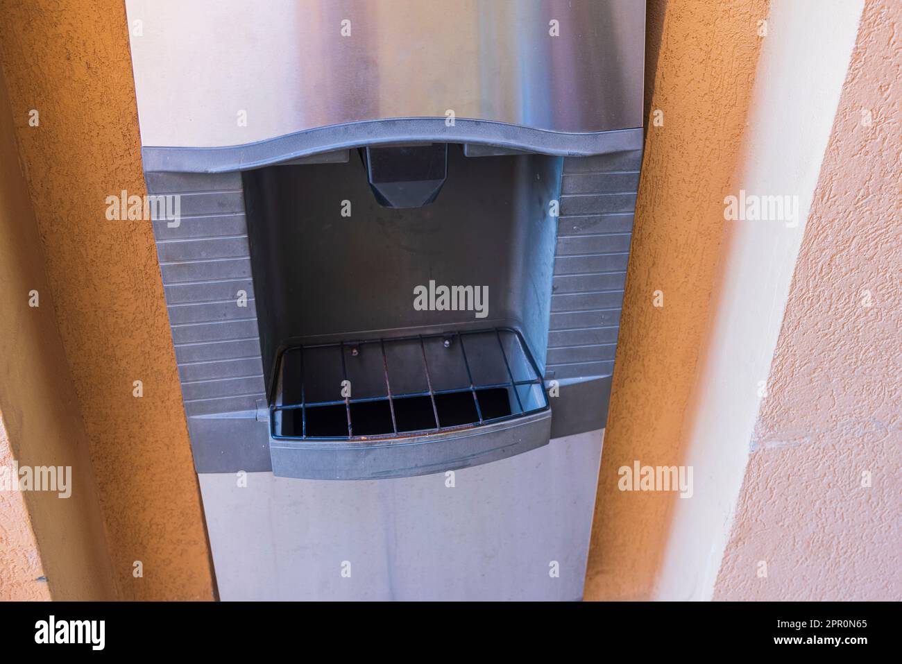 Closeup view of an ice machine making ice cubes in hotel of Aruba