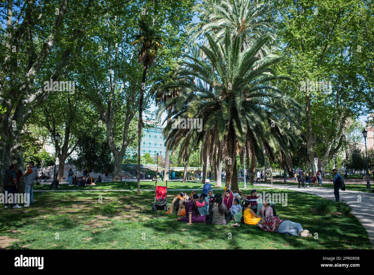 A Sikh family in the gardens of Piazza Vittorio during the procession