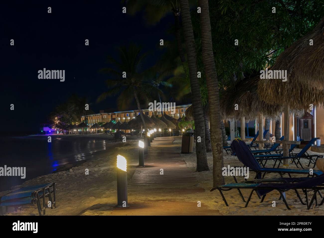 Beautiful night view of Atlantic Ocean with hotel's sandy beach with