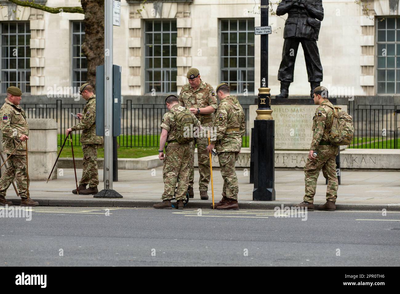 London, UK. 25th Apr, 2023. British army Soldiers in Whitehall mark out the route for the coronation Stock Photo