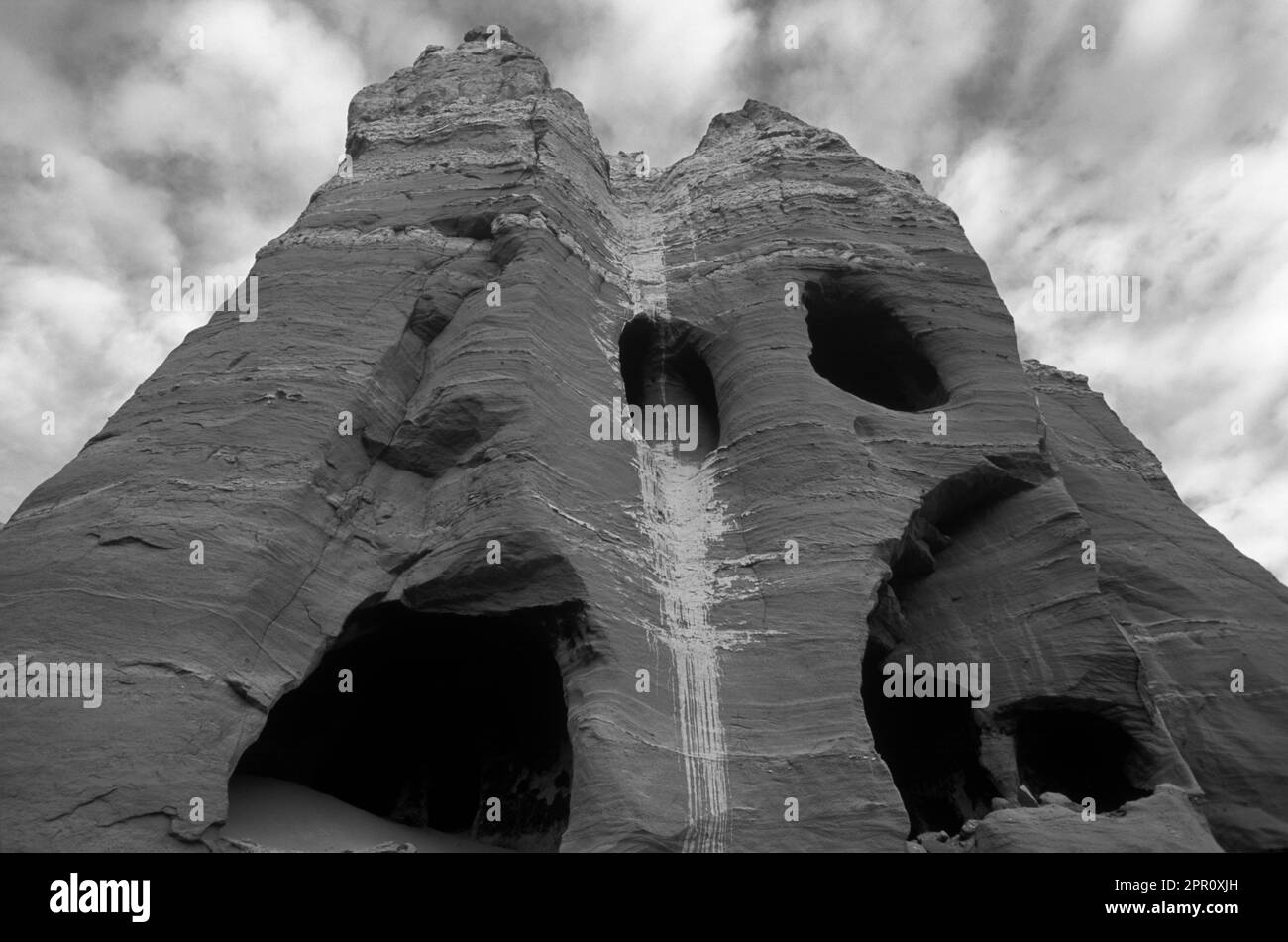 Multilevel CAVE DWELLINGS near THOLING date back to the 10th C. in the GUGE KINGDOM west of KAILASH - TIBET Stock Photo