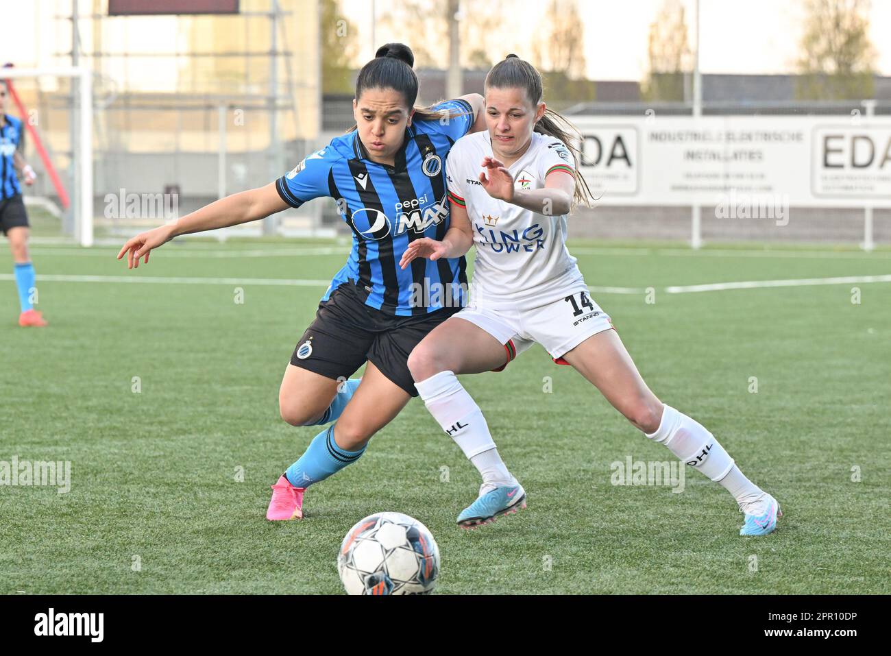Sakina Ouzraoui Diki (11) of Brugge and Shari Van Belle (14) of OHL