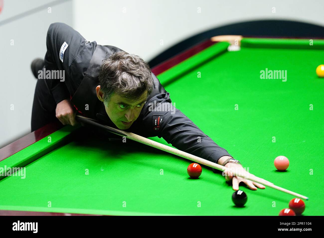 Ronnie OSullivan in action against Luca Brecel (not pictured) on day eleven of the Cazoo World Snooker Championship at the Crucible Theatre, Sheffield