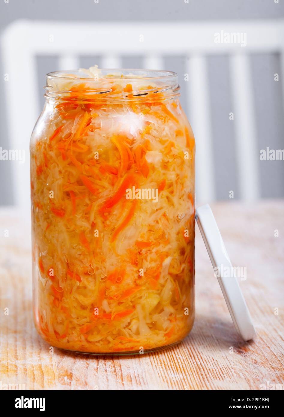 Glass jar with traditional Russian sauerkraut on table Stock Photo Alamy