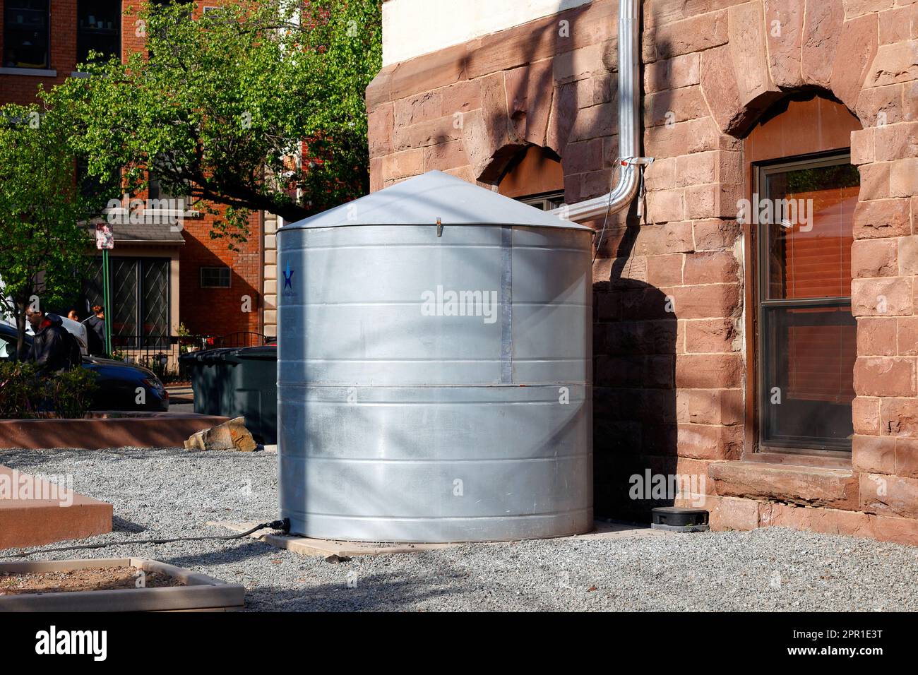 One of four 400 gal capacity galvanized rainwater cisterns used to collect rainwater from the rooftop of Hoboken City Hall. Stock Photo
