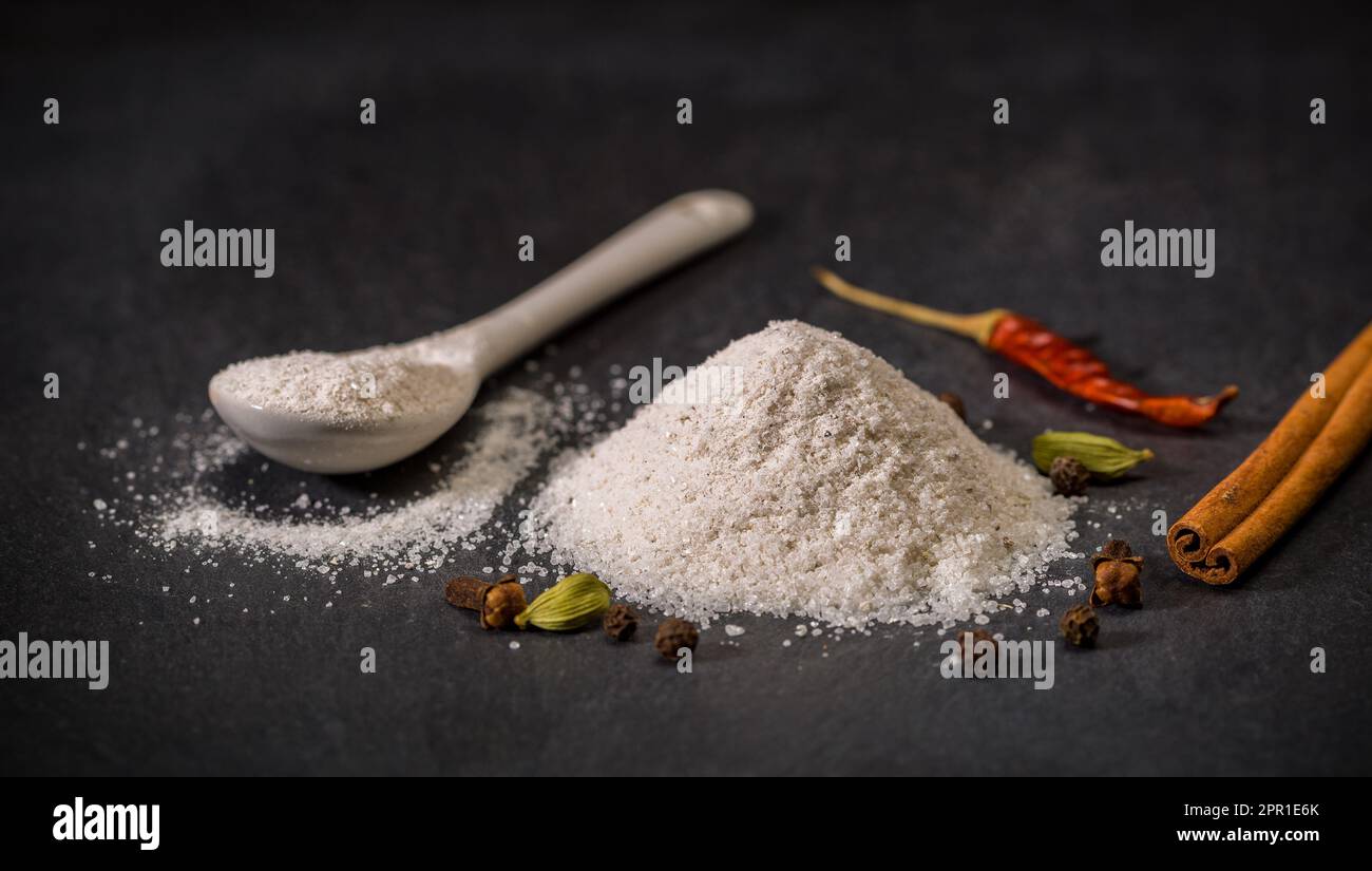 Spices for recipes. Viennese sugar. Spoon and pile of sugar, cinnamon