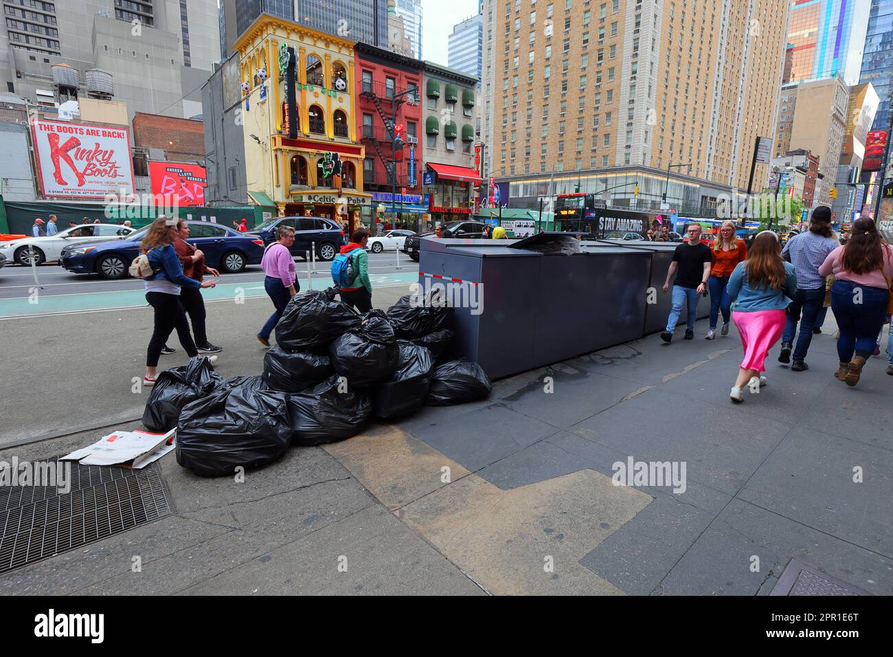 Rat proof trash collection bins in Times Square. The storage containers are approved under NYC's Clean Curbs program for the temporary storage of garb Stock Photo