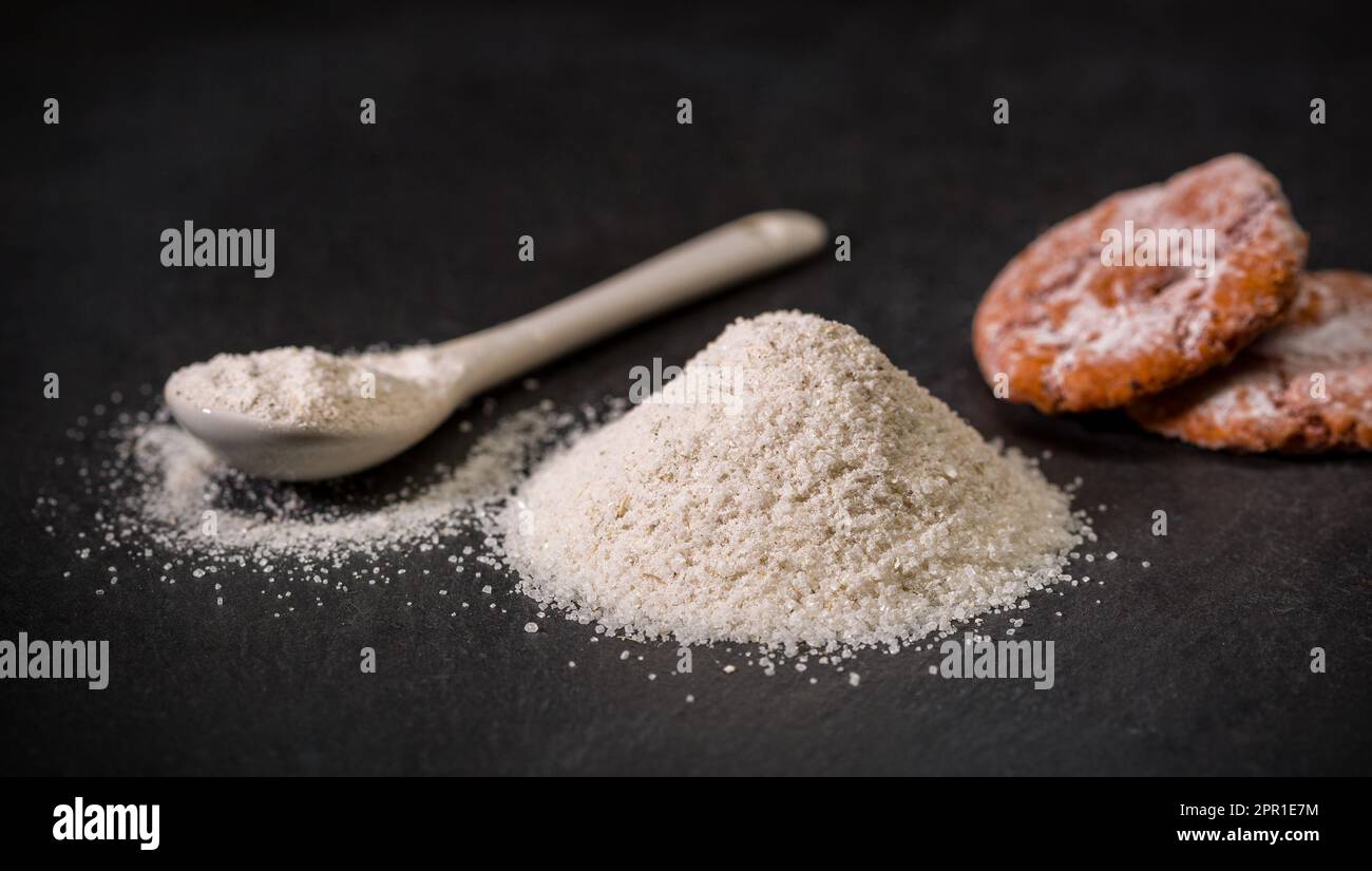 Spices for recipes. Viennese sugar. A spoon and a pile of sugar, salt