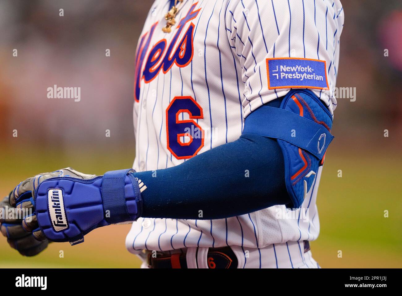 New York Mets' Starling Marte (6) returns to the dugout after