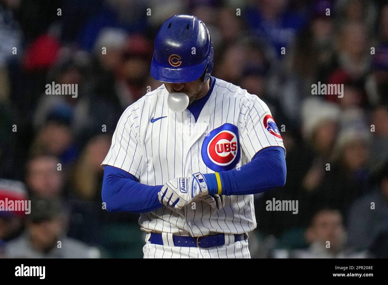 Chicago Cubs' Patrick Wisdom blows a bubble while batting during the fourth  inning of the team's baseball game against the San Diego Padres on Tuesday,  April 25, 2023, in Chicago. (AP Photo/Erin